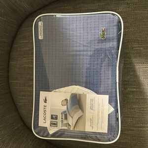 Lacoste King size duvet.  Never been out of the package.